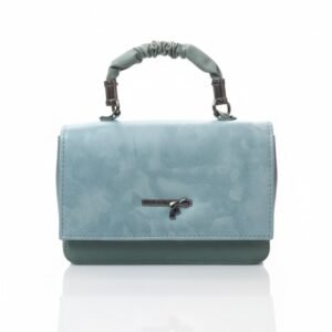 Front view of a mist blue genuine leather flap bag with a ruched top handle and gunmetal hardware on a white reflective surface.